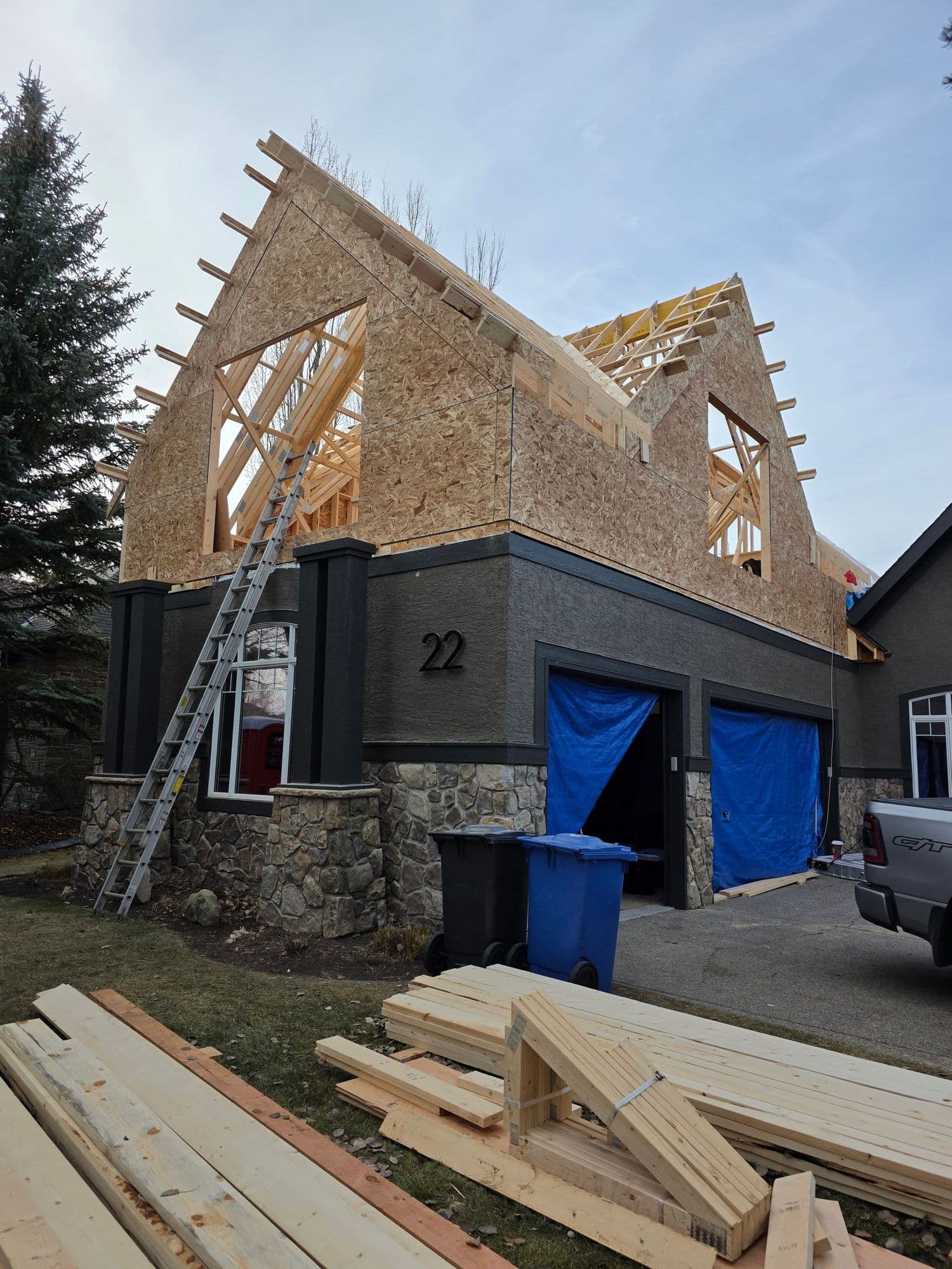 Home addition in progress Calgary — exterior build